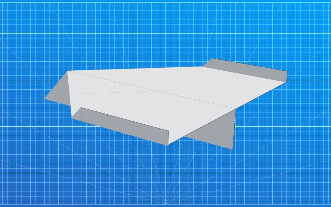The finished Lock-Bottom paper airplane, on a blueprint